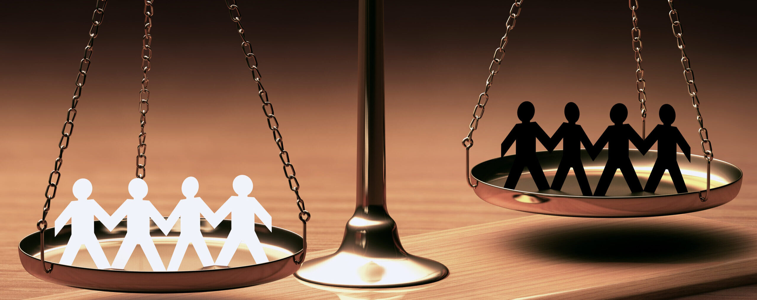 scales of justice reflecting racial imbalance